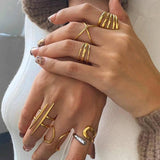 Inel inox forma X, placaj aur 18K /54